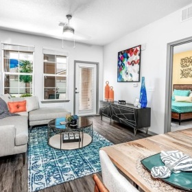 a living room with a couch and a table